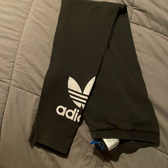 EUC Adidas black leggings w/ white symbol on the bottom of each legs - Picture 1 of 3